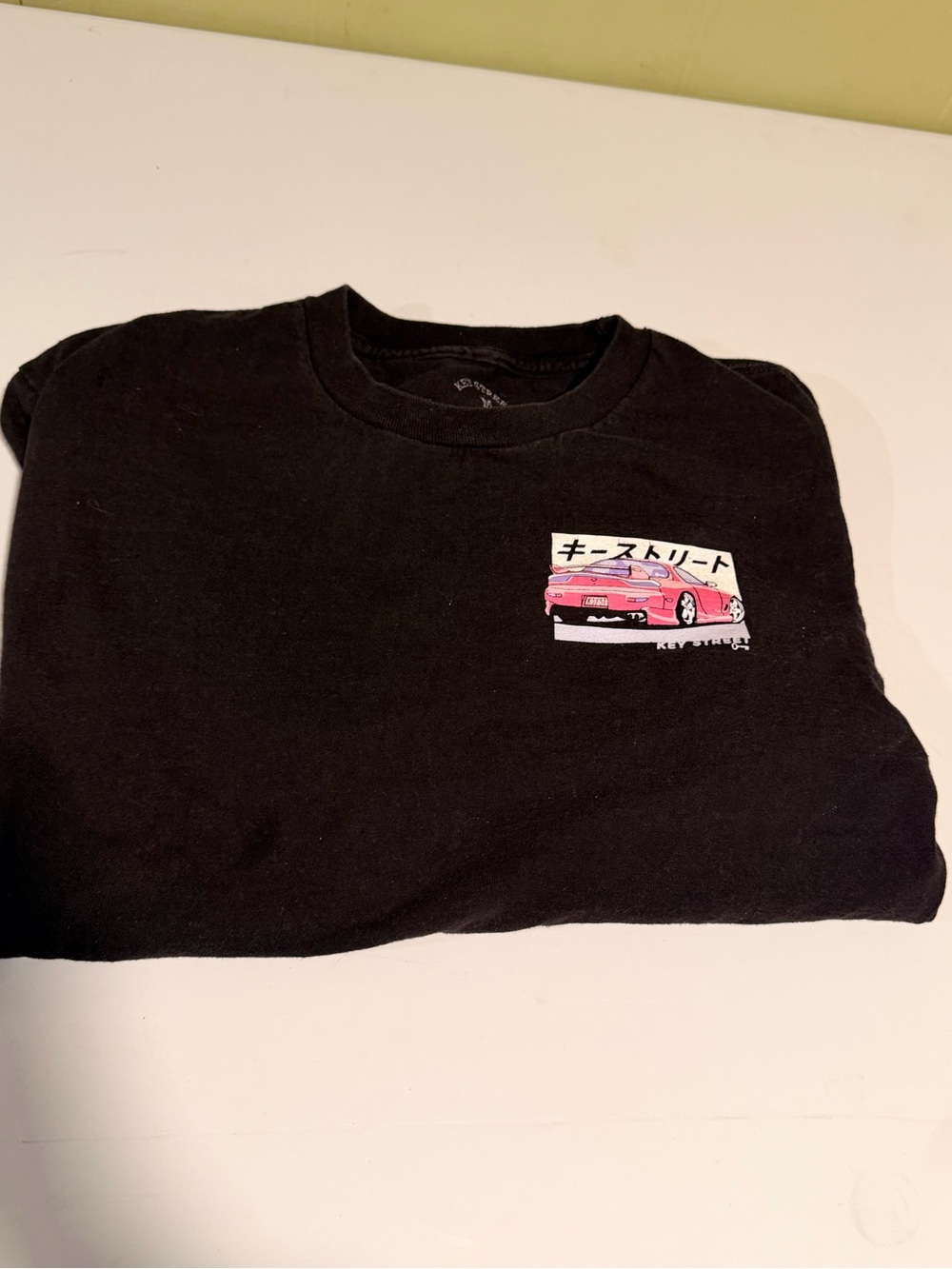 Black Long Sleeve Graphic Tee with Pink Car Graphic
